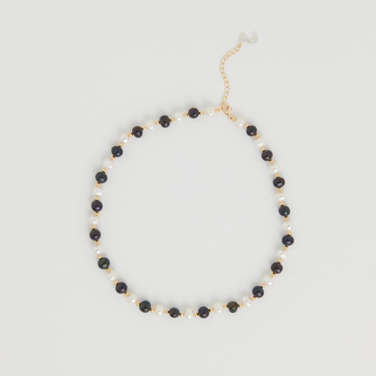 Item Image of Nectar Necklace from Juxtaposition Studio in Seoul Korea, Black and Ivory White Freshwater Pearl Necklace with 18k Gold Plating on Brass