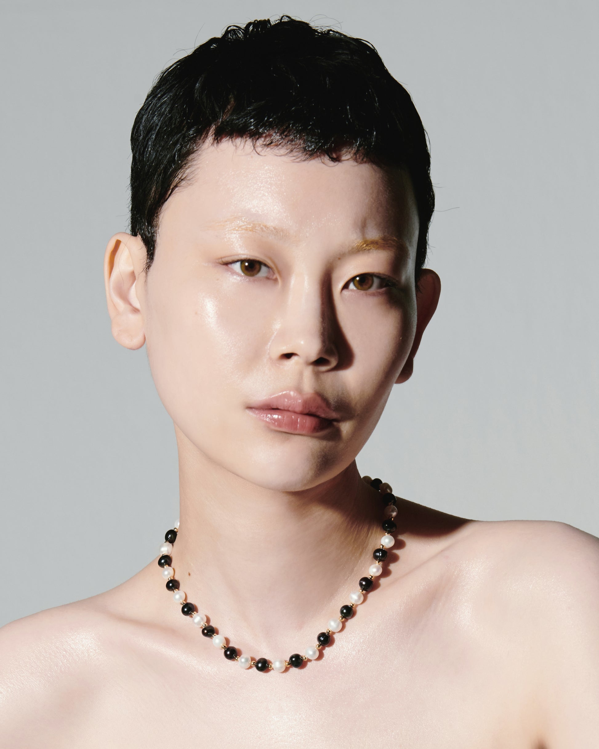 Model Wearing Nectar Black and White Ivory Pearls With Gold Metal Beads Necklace Choker Classic Modern Style Seoul Korea